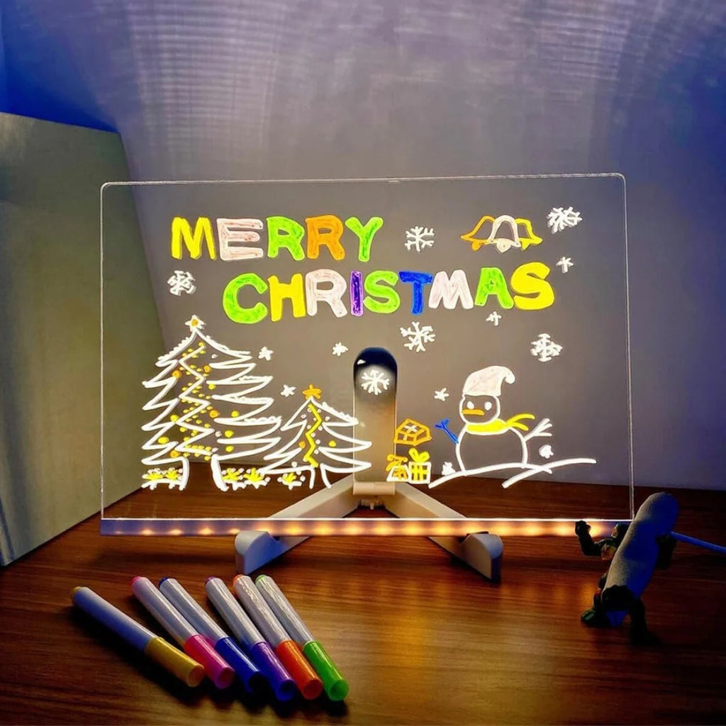 Real photo of the LED drawing board lit up with a Christmas drawing