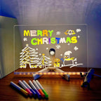 Real photo of the LED drawing board lit up with a Christmas drawing